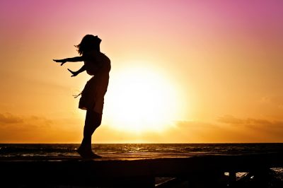 a person watching the sunrise