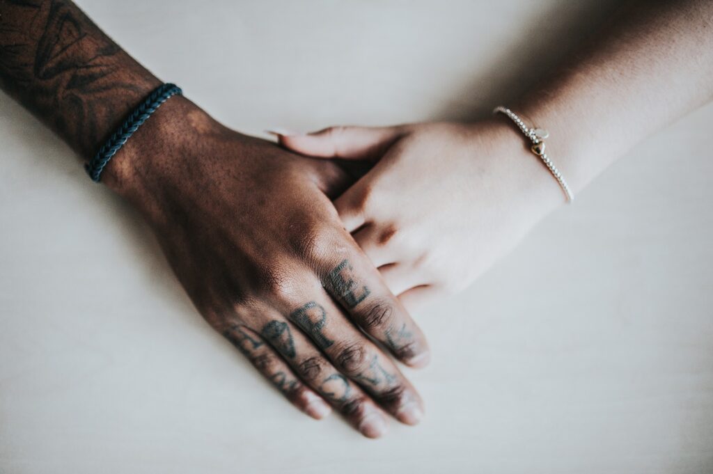 two people holding hands